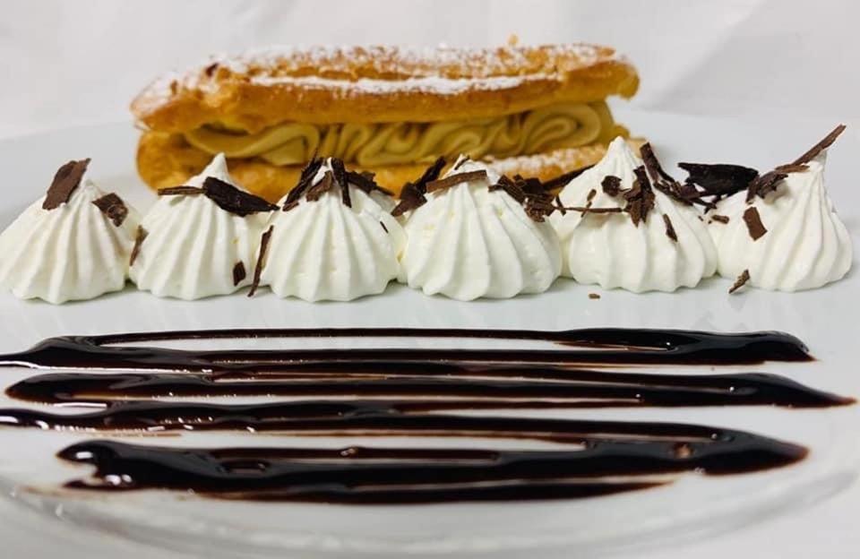 Hotel Restaurant L'Orchidee อ็องซิแซ็ง ภายนอก รูปภาพ