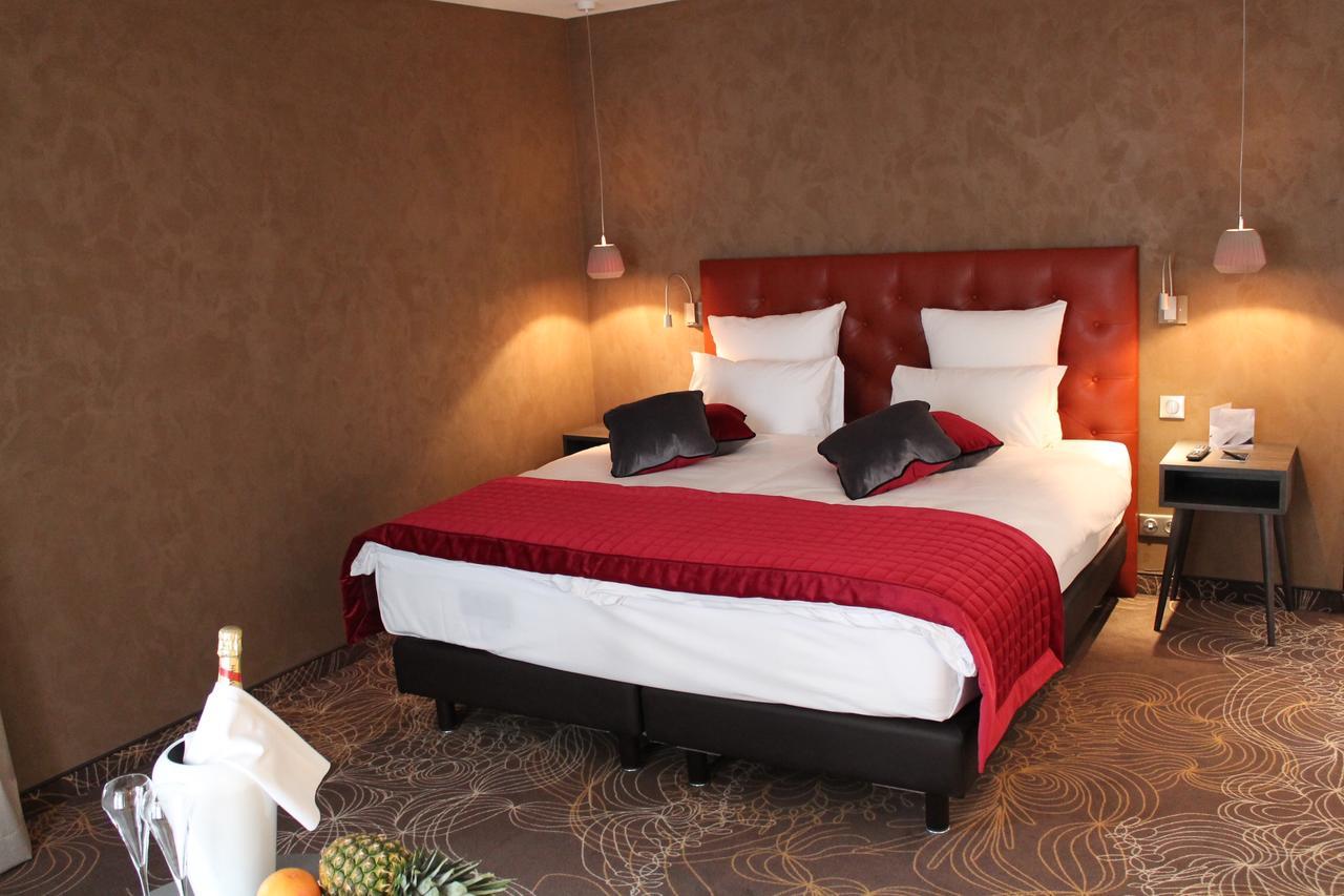 Hotel Restaurant L'Orchidee อ็องซิแซ็ง ภายนอก รูปภาพ